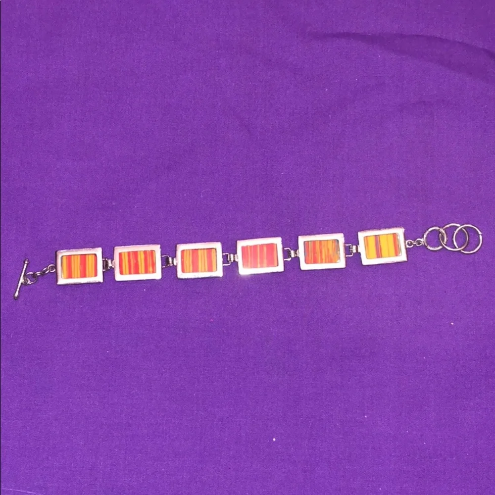 Orange resin striped bracelet 8”‎
